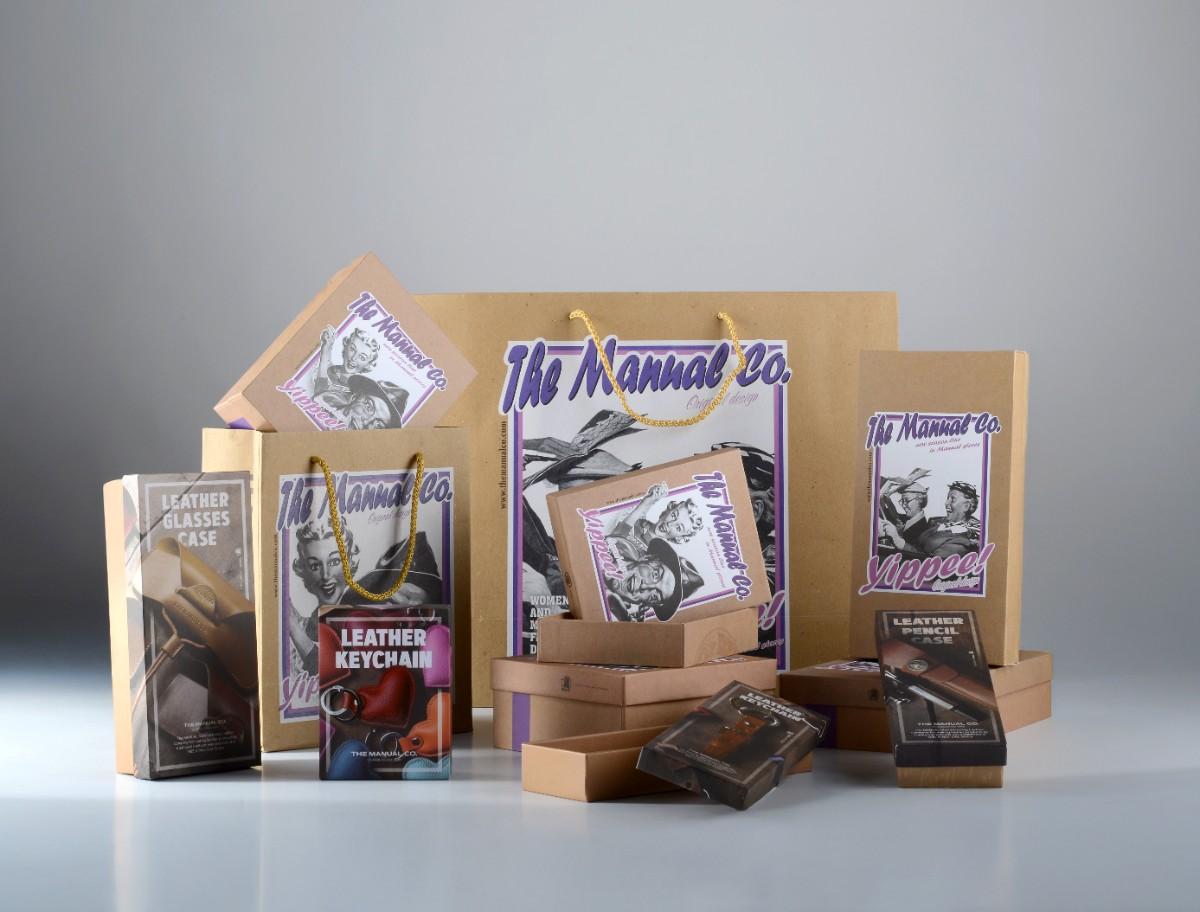 Brown gifts with retro art, labeled "Leather Keychain", "Glasses Case"